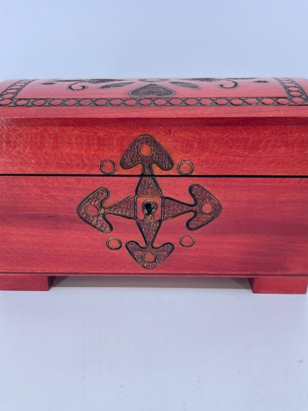 vintage handcrafted polish red wooden box with ornate engravings hinged lid